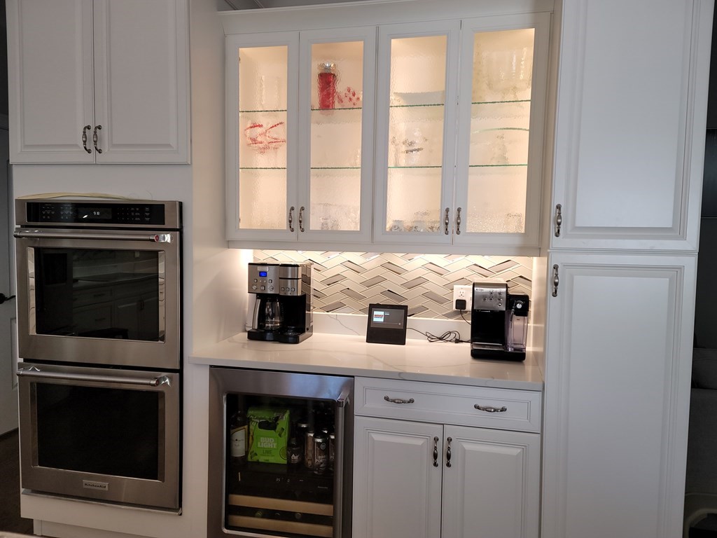 70 Ryan Farm Road, Unit 13 Windham, NH 03087 - Photo 7 of 13 a kitchen with appliances cabinets and a window