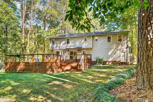 a backyard of a house with lots of green space