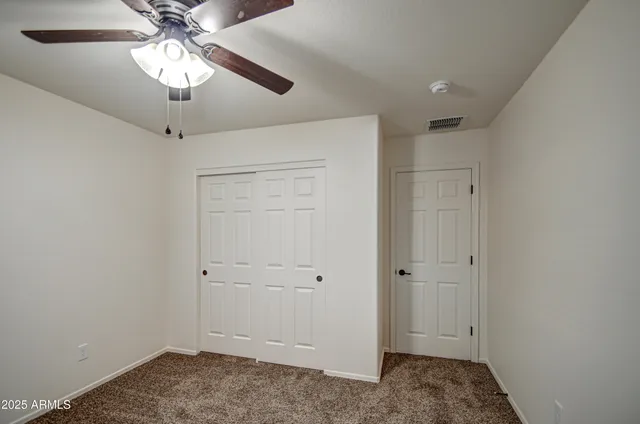 a view of a chandelier fan
