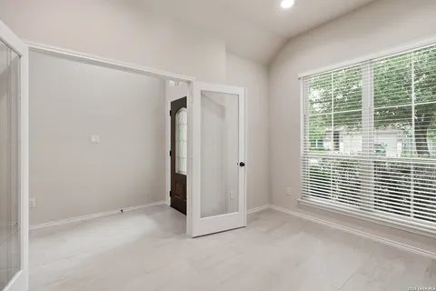 a view of a room with windows
