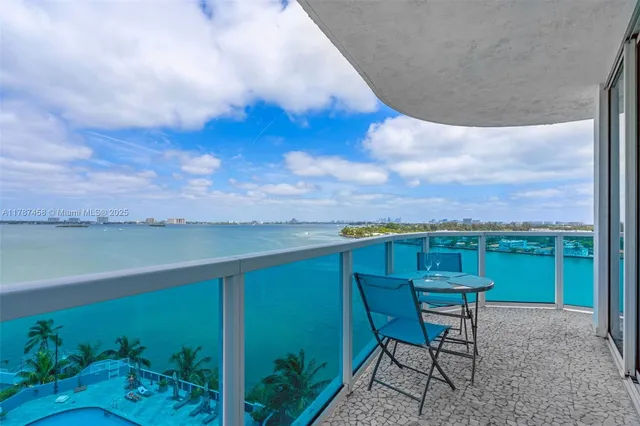 a view of a balcony with an outdoor space
