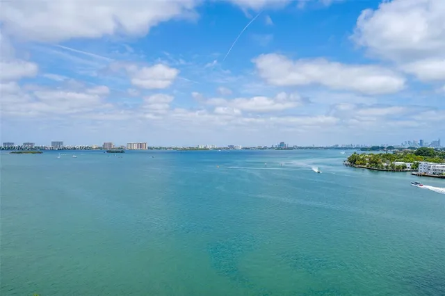 a view of a lake from a balcony