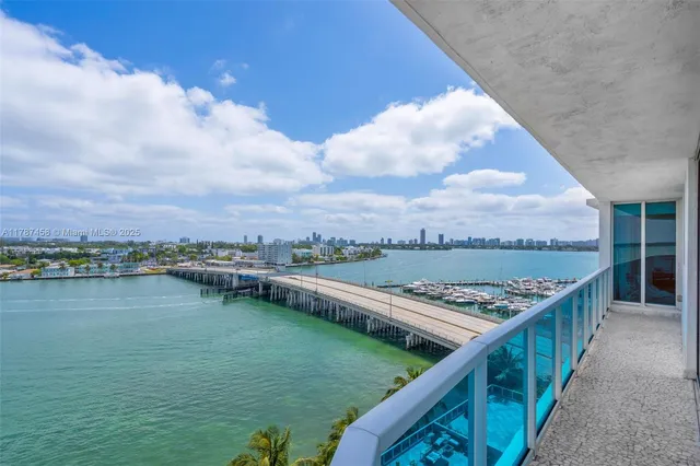 a view of a lake from a balcony