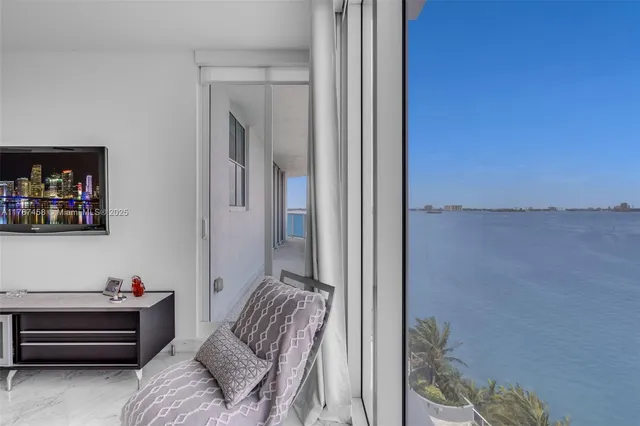 a bathroom with a double vanity sink mirror and toilet