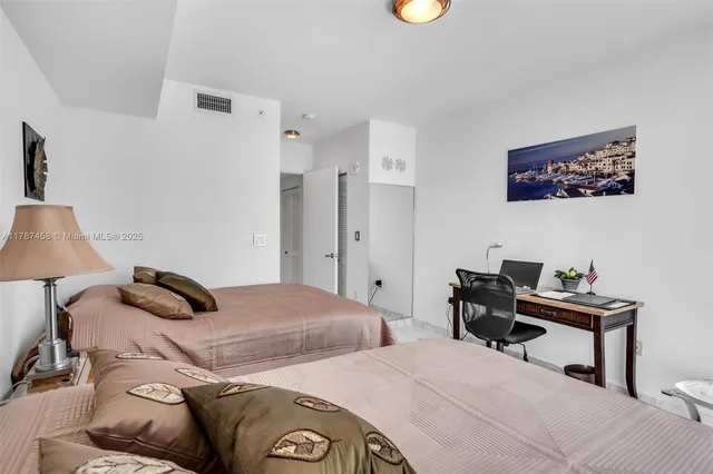 a view of entryway with washer and dryer