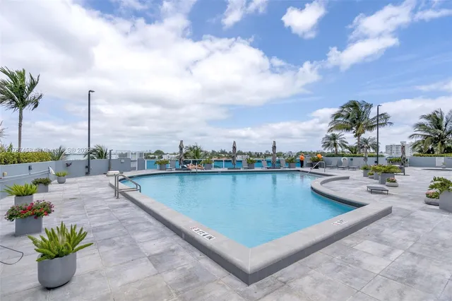 a view of outdoor space with swimming pool