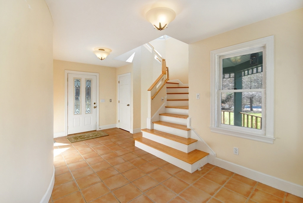 21 Kettle Hole Road Bolton, MA 01740 - Photo 12 of 39 a view of a room with stairs and a window