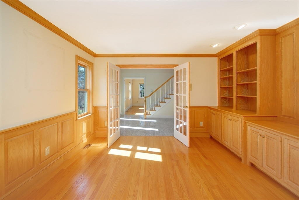 21 Kettle Hole Road Bolton, MA 01740 - Photo 17 of 39 a view of a hallway with wooden floor and front door