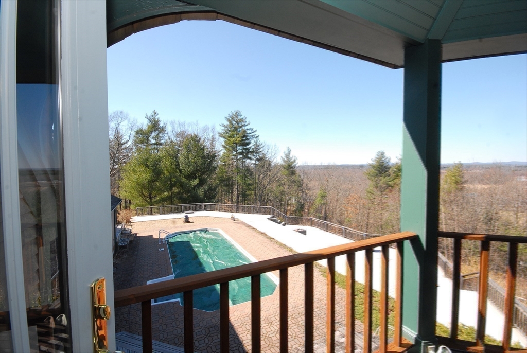 21 Kettle Hole Road Bolton, MA 01740 - Photo 26 of 39 a view of a balcony with yard