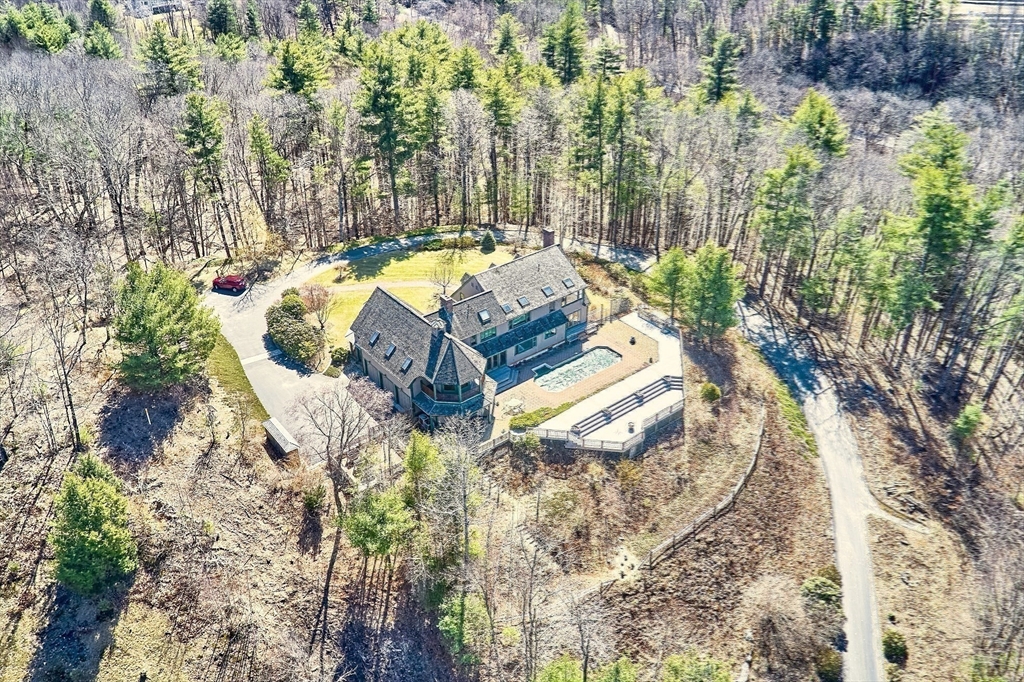 21 Kettle Hole Road Bolton, MA 01740 - Photo 27 of 39 a view of a backyard with swimming pool