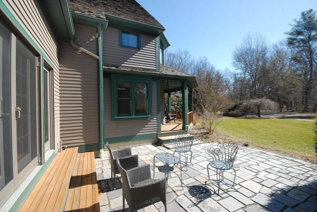 21 Kettle Hole Road Bolton, MA 01740 - Photo 31 of 39 a view of house with backyard porch and patio