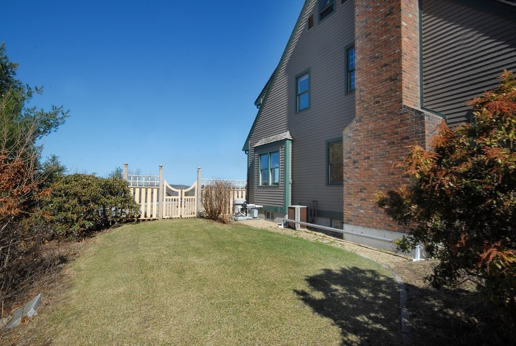 21 Kettle Hole Road Bolton, MA 01740 - Photo 35 of 39 a view of a house with backyard and sitting area