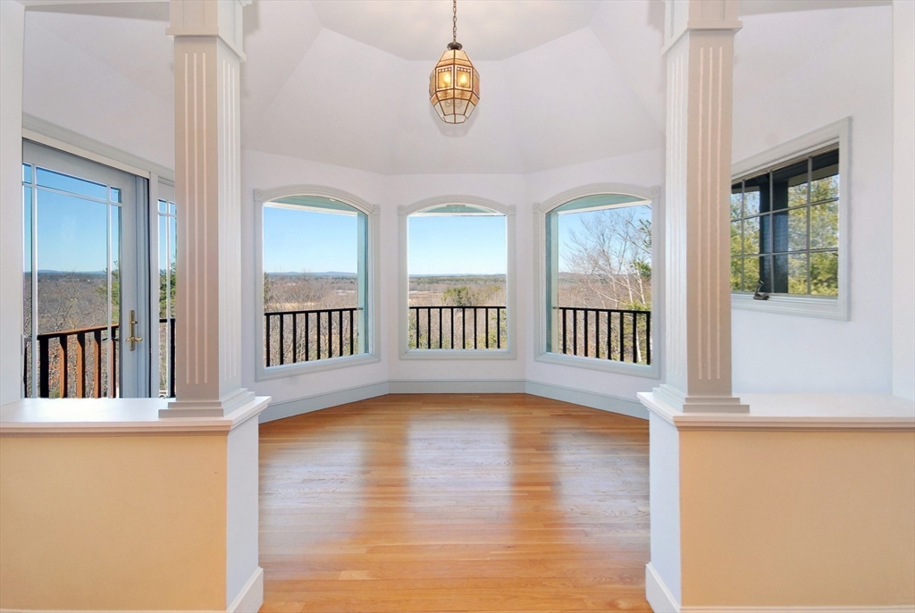 21 Kettle Hole Road Bolton, MA 01740 - Photo 5 of 39 a view of an entryway with wooden floor