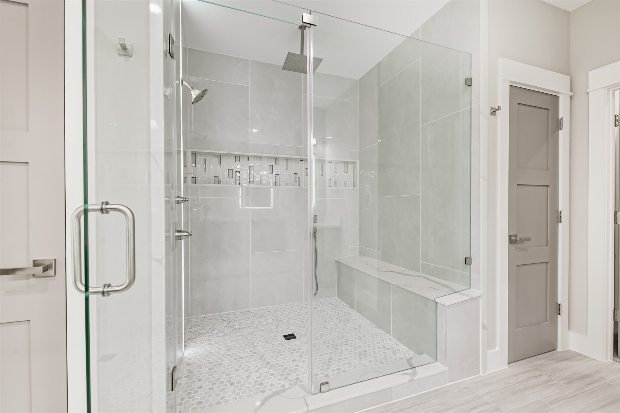 2643 Dalview Street Houston, TX 77091 - Photo 5 of 12 a bathroom with a glass shower door