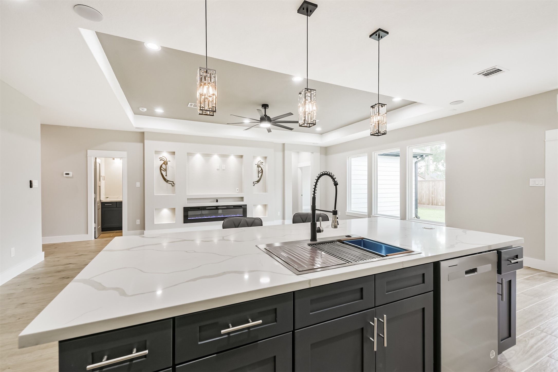 2643 Dalview Street Houston, TX 77091 - Photo 8 of 12 a view of living room with granite countertop a sink and chandelier