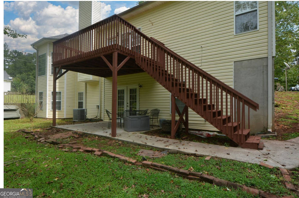 102 Buell Jones Road Carrollton, GA 30117 - Photo 22 of 27 a view of house with a yard