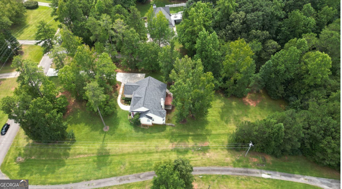 102 Buell Jones Road Carrollton, GA 30117 - Photo 4 of 27 a view of a garden