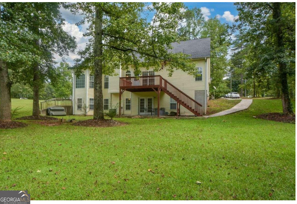 102 Buell Jones Road Carrollton, GA 30117 - Photo 5 of 27 a view of a house with a yard