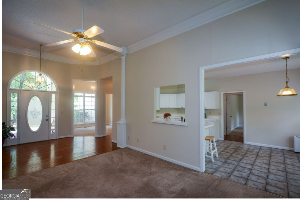 102 Buell Jones Road Carrollton, GA 30117 - Photo 8 of 27 a view of a livingroom with a chandelier