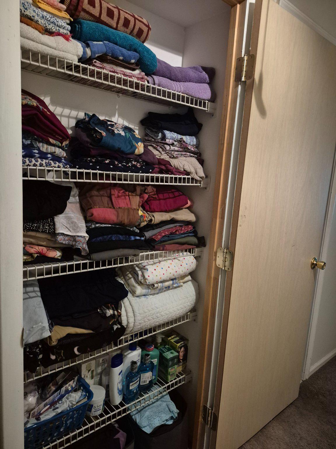 13806 Carter House Way, Unit 16145 Silver Spring, MD 20904 - Photo 37 of 45 Linen Closet has multiple shelves.