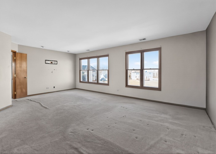 3902 Edgewater Drive Hazel Crest, IL 60429 - Photo 12 of 23 an empty room with windows