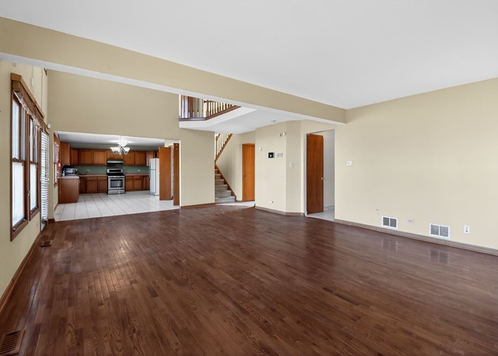 3902 Edgewater Drive Hazel Crest, IL 60429 - Photo 7 of 23 a view of a livingroom with wooden floor and furniture