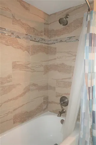 a bathroom with a bathtub