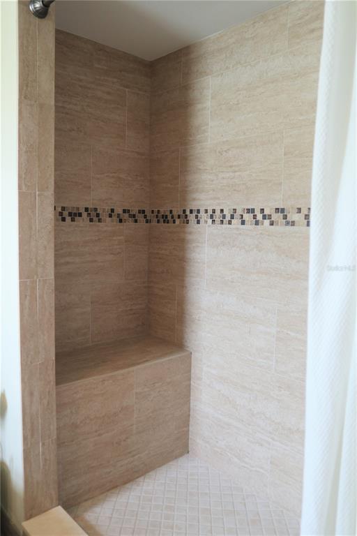 1468 South Evergreen Avenue Clearwater, FL 33756 - Photo 8 of 23 a bathroom with a shower