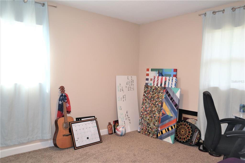 1468 South Evergreen Avenue Clearwater, FL 33756 - Photo 9 of 23 a view of room with toys
