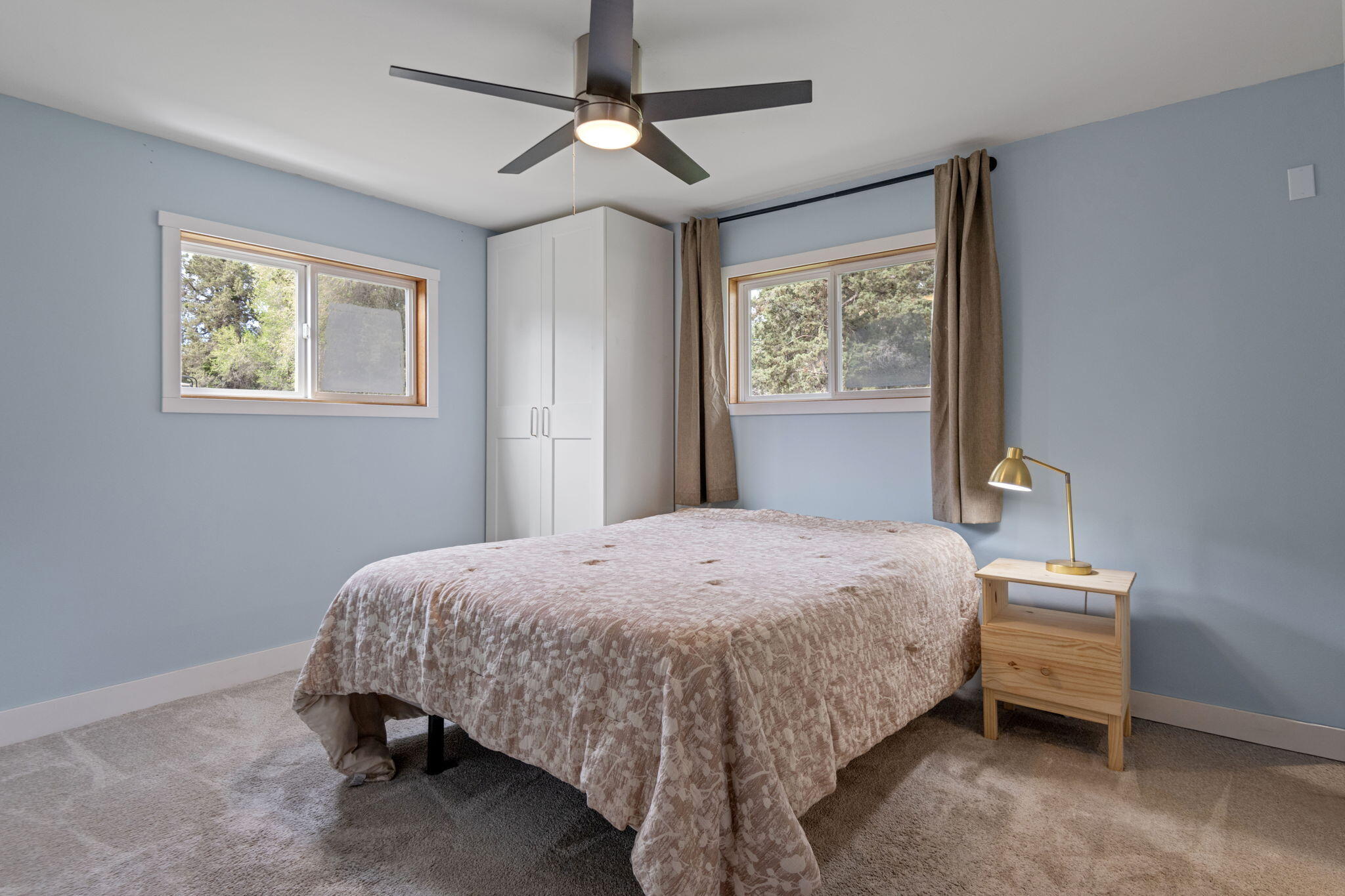 1971 Southwest 25th Street Redmond, OR 97756 - Photo 13 of 30 a bedroom with a bed and a window