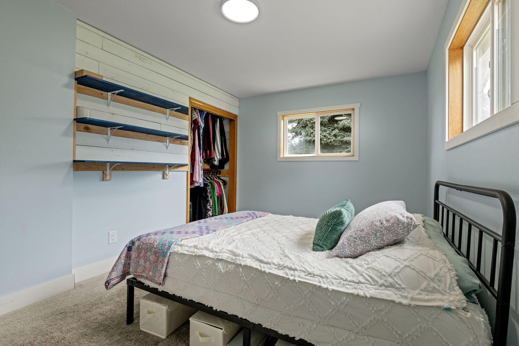 1971 Southwest 25th Street Redmond, OR 97756 - Photo 18 of 30 a bedroom with a bed and a window