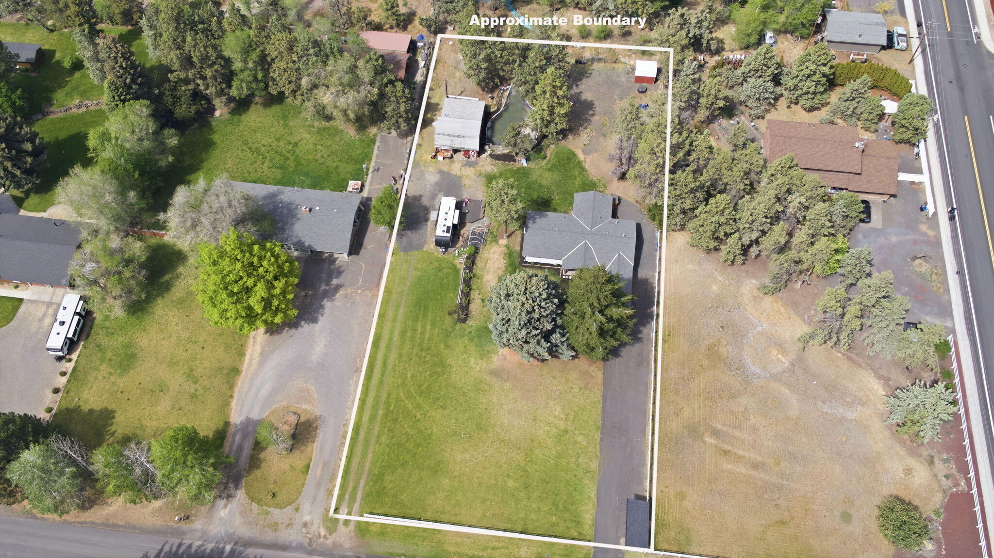 1971 Southwest 25th Street Redmond, OR 97756 - Photo 5 of 30 an aerial view of residential houses with outdoor space