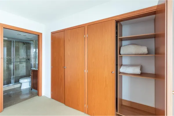 a view of balcony with furniture