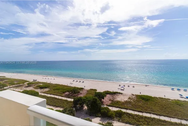 an aerial view of beach and ocean