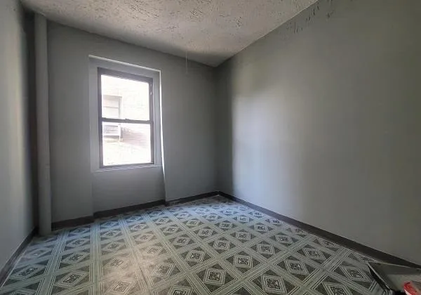 an empty room with a window