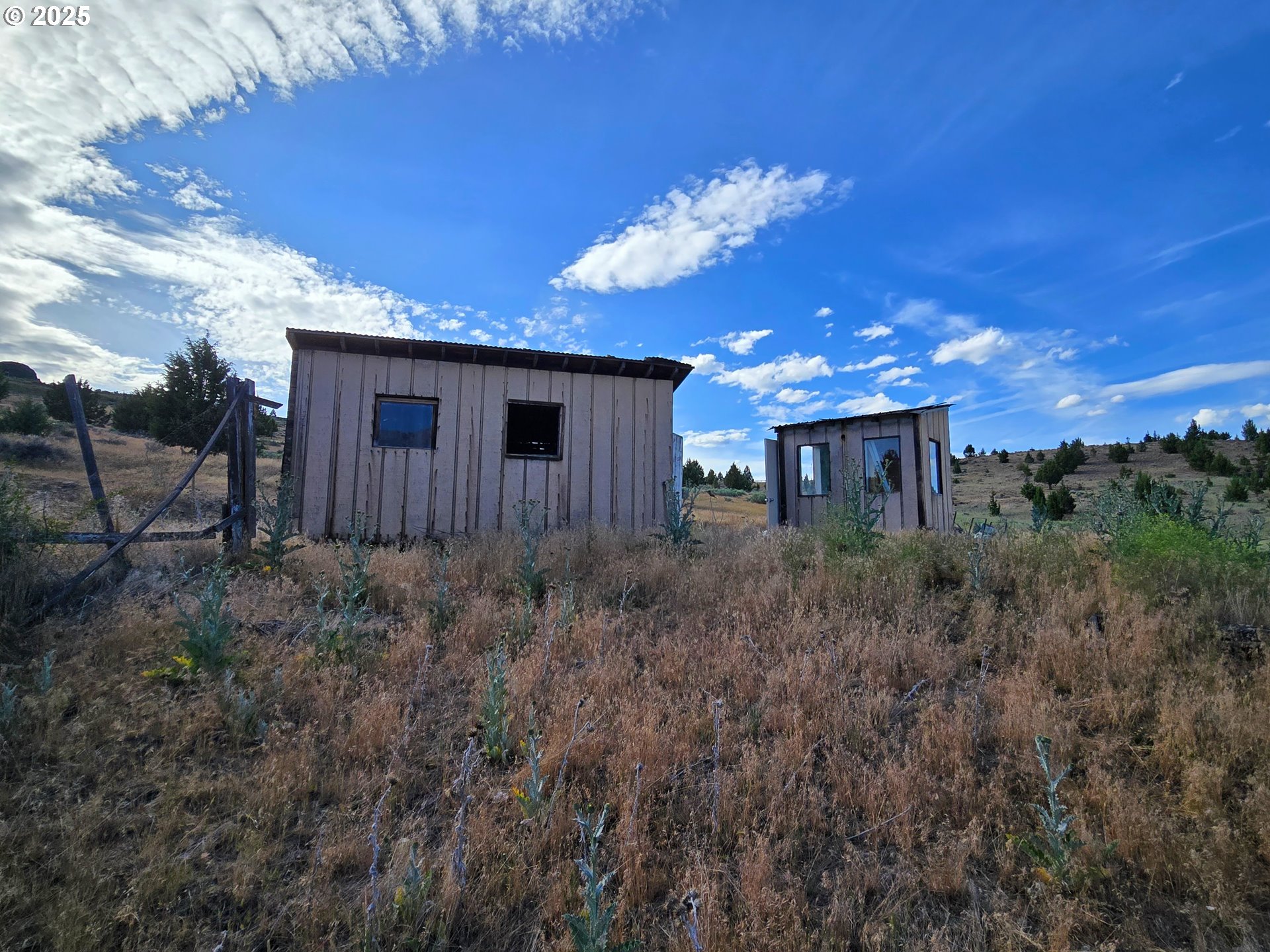 26113 West Bench Road John Day, OR 97845 - Photo 4 of 17 a view of a house with a yard