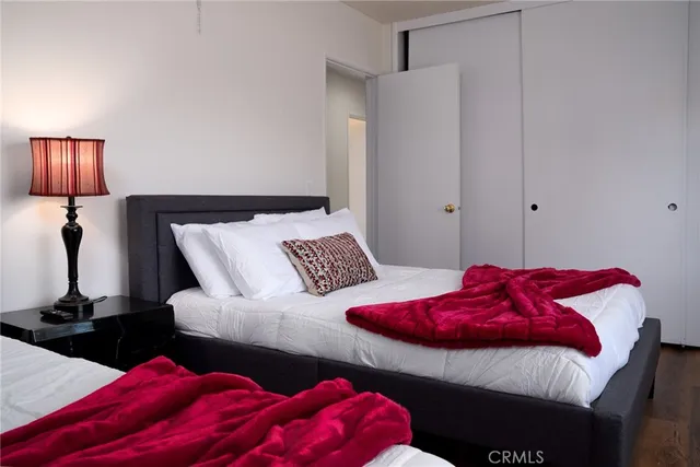 a dining room with furniture and a potted plant