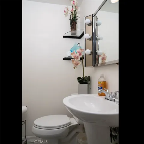 a view of a house next to a yard