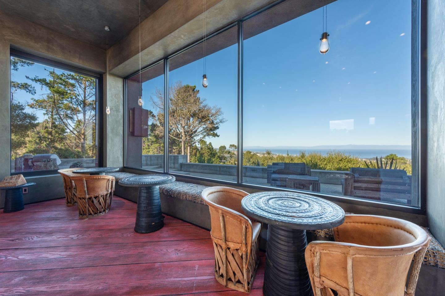 566 Aguajito Road Carmel, CA 93923 - Photo 13 of 78 a view of a couches and dinning table in patio