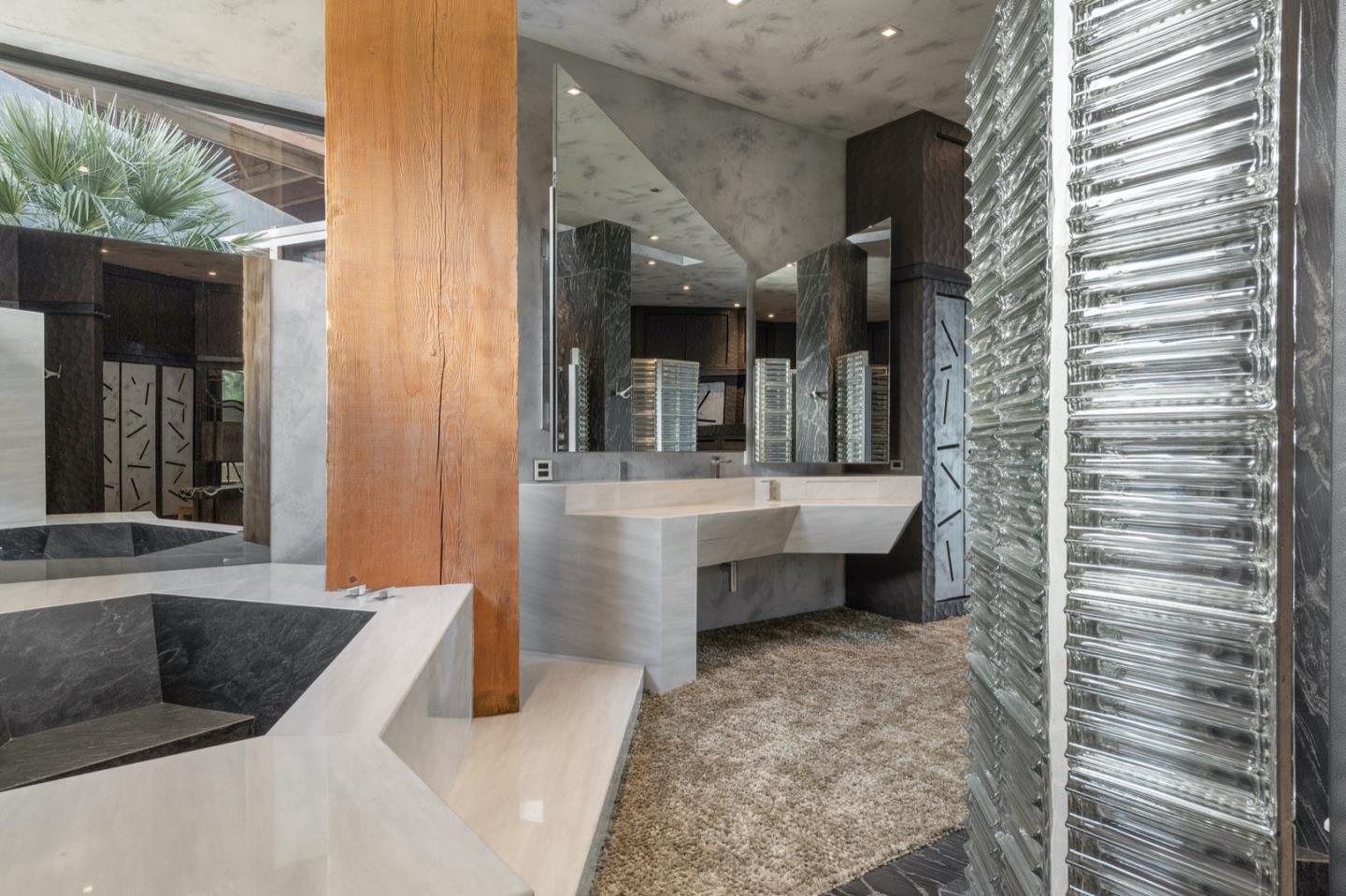 566 Aguajito Road Carmel, CA 93923 - Photo 37 of 78 a bathroom with a bathtub and a sink