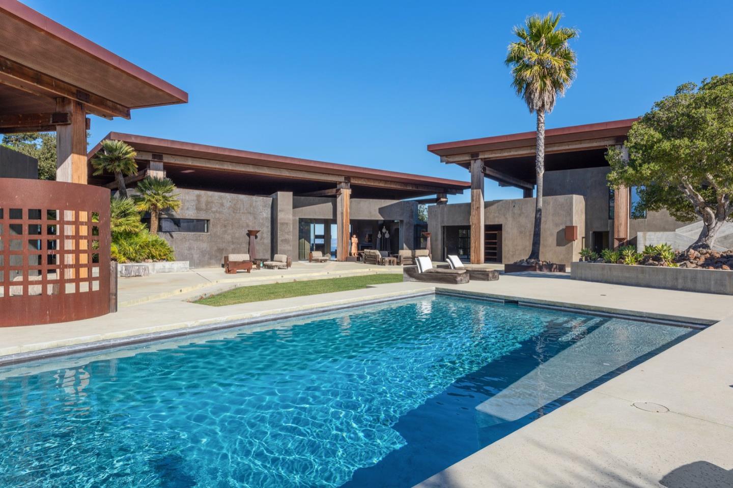 566 Aguajito Road Carmel, CA 93923 - Photo 53 of 78 a view of a house with swimming pool