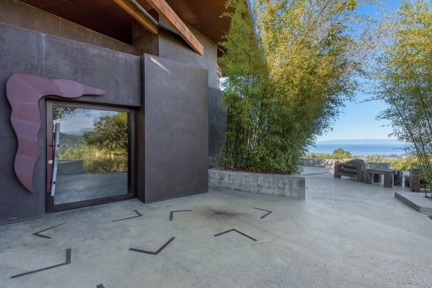 566 Aguajito Road Carmel, CA 93923 - Photo 6 of 78 a view of a room with a patio and a fire pit