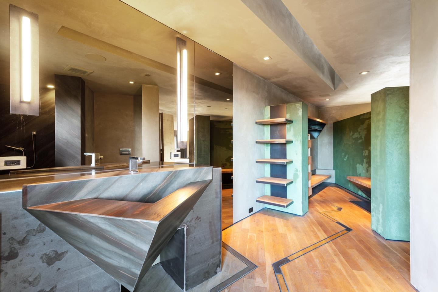 566 Aguajito Road Carmel, CA 93923 - Photo 65 of 78 a living room with stainless steel appliances furniture a rug and a large window