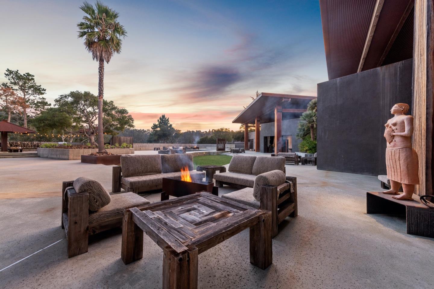 566 Aguajito Road Carmel, CA 93923 - Photo 70 of 78 a terrace of a house with outdoor seating