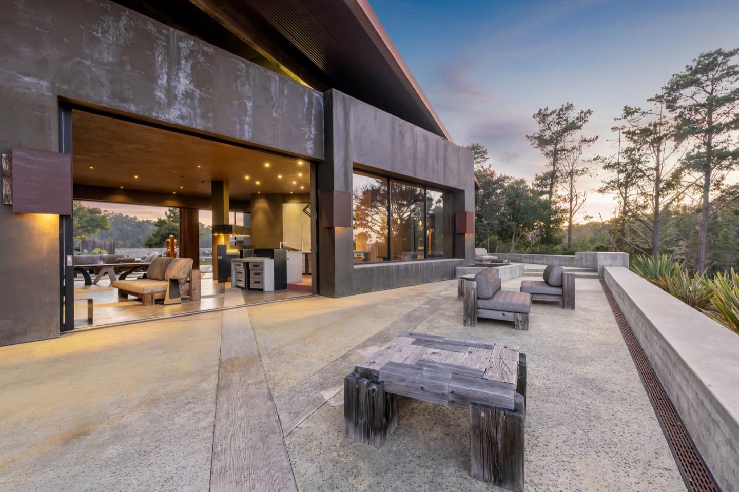 566 Aguajito Road Carmel, CA 93923 - Photo 74 of 78 a balcony with table and chairs