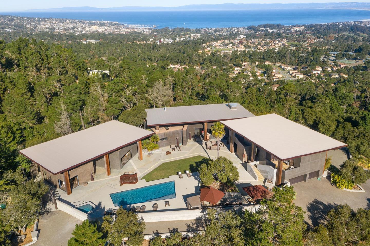 566 Aguajito Road Carmel, CA 93923 - Photo 78 of 78 an aerial view of a house with a yard