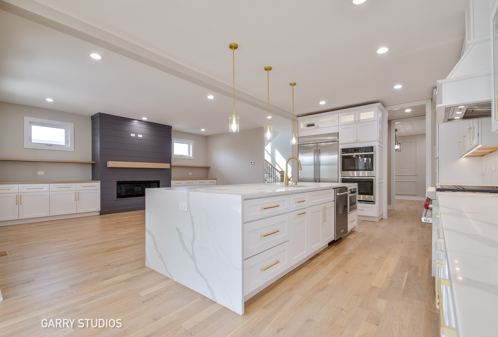 15W320 Concord Street Elmhurst, IL 60126 - Photo 12 of 20 a large kitchen with stainless steel appliances kitchen island a large counter top and a sink