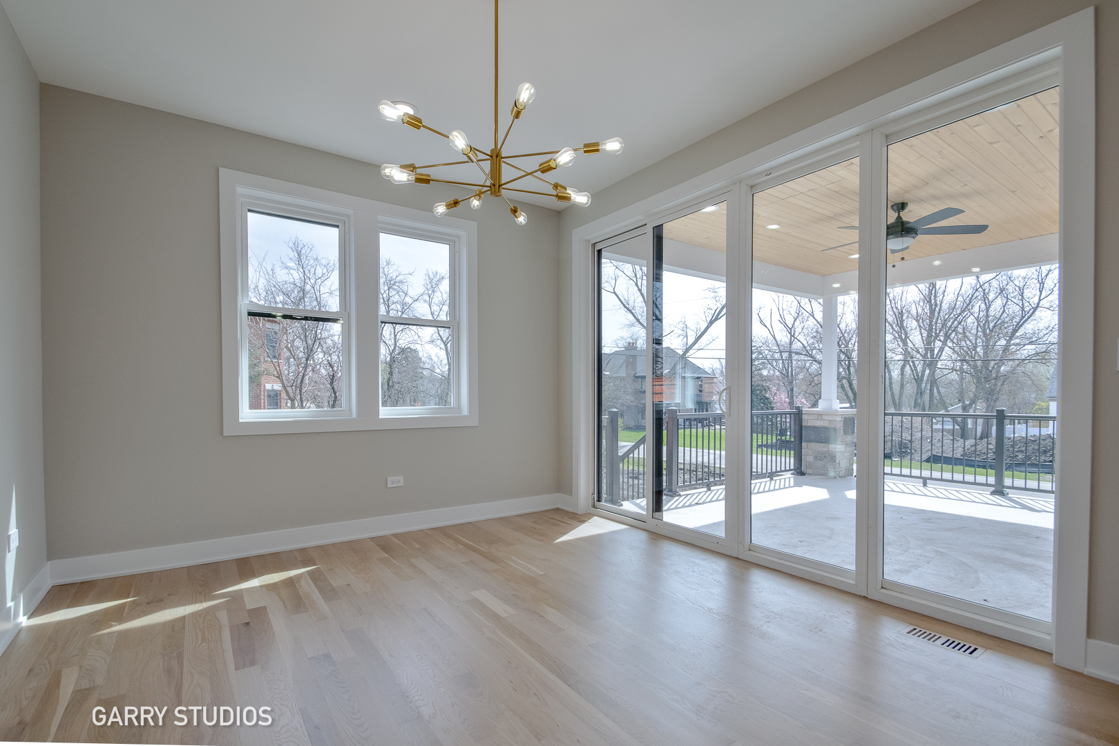 15W320 Concord Street Elmhurst, IL 60126 - Photo 13 of 20 a view of an empty room with wooden floor and a window