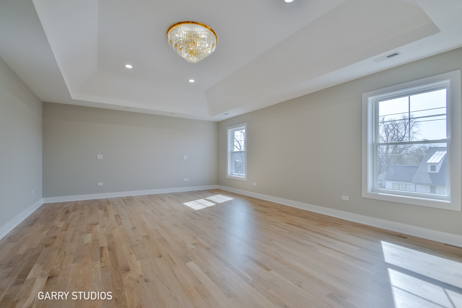 15W320 Concord Street Elmhurst, IL 60126 - Photo 15 of 20 an empty room with wooden floor and windows