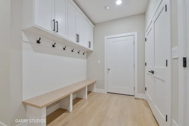 a view of an empty room with closet